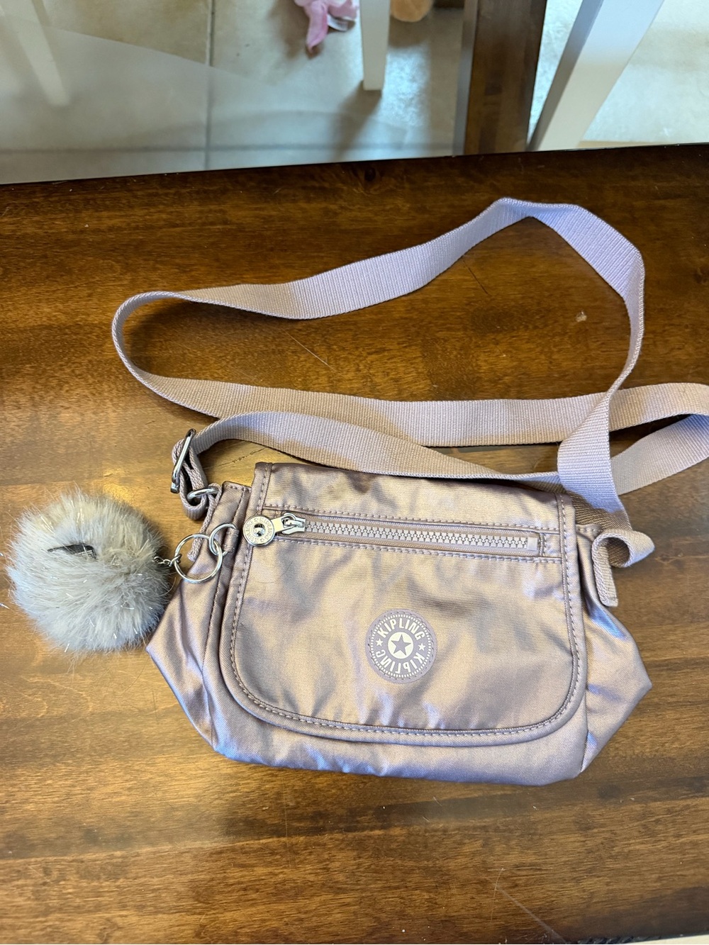 Kipling Lavender Crossbody Bag with Pom Pom